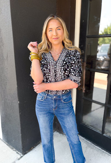 Your Own Path Top, black and white floral blouse with v-neck, smocked detail down the chest and on the cuffs of the sleeves 