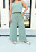 Z SUPPLY Scout Jersey Flare Pant in Palm Green, elastic waist band wide leg pant with pockets in a washed sage green