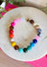 Bring on the sunshine and color! This chunky beaded necklace is the ultimate summer statement piece. Featuring a vibrant mix of colorful beads, it instantly adds a fun, playful touch to any outfit. Whether you're styling it with a simple tank, a breezy sundress, or your favorite vacation look, this necklace does all the heavy lifting. The chunky design keeps it right on trend, while the cheerful colors make it impossible not to smile. 