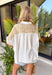 This white gauze button down top is bringing all the fun, feel-good summer vibes! With its colorful floral print in shades of blue, green, pink, yellow, and orange, plus the cutest purple and white gingham details, it has that playful patchwork-inspired look that totally stands out. The lightweight gauze fabric keeps it breathable and easy for hot days, while the collared neckline adds a touch of structure. It’s one of those tops that instantly brightens your outfit—just pair it with denim or shorts and go.