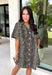 Classic denim meets a timeless animal print in this effortlessly stylish dress. This neutral leopard print denim dress is the perfect balance of bold and versatile. The button-front design and short sleeves give it an easy, everyday feel, while the front patch pockets and side pockets add both charm and function. Crafted from a soft cotton blend with just the right amount of stretch, this dress is made for everything from casual weekends to lunch dates and fall adventures.