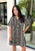 Classic denim meets a timeless animal print in this effortlessly stylish dress. This neutral leopard print denim dress is the perfect balance of bold and versatile. The button-front design and short sleeves give it an easy, everyday feel, while the front patch pockets and side pockets add both charm and function. Crafted from a soft cotton blend with just the right amount of stretch, this dress is made for everything from casual weekends to lunch dates and fall adventures.