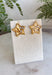 Bring a little sparkle and timeless charm to your jewelry collection with these dazzling star stud earrings. Crafted in a classic gold finish, each petite star is adorned with shimmering crystal accents that beautifully catch the light from every angle. Their classic design makes them perfect for everyday wear while adding just the right amount of shine to special occasions. Lightweight, comfortable, and endlessly versatile, these earrings are a must-have accessory you'll reach for again and again.