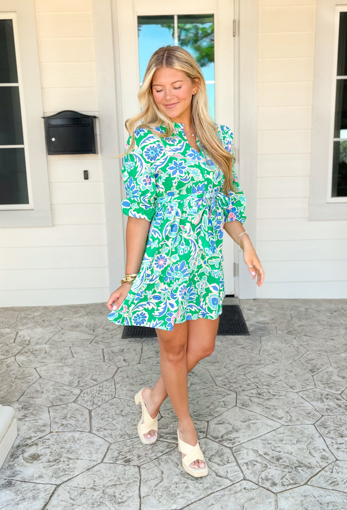 Breath Of Fresh Air Dress, kelly green quarter sleeve button down floral print dress with white lace details and cobalt blue and pink paisley floral design, tie belt around the waist 