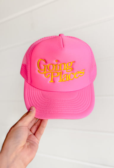 Friday + Saturday: Going Places Trucker in Pink, neon pink trucker hat with "going places" embroidered in yellow