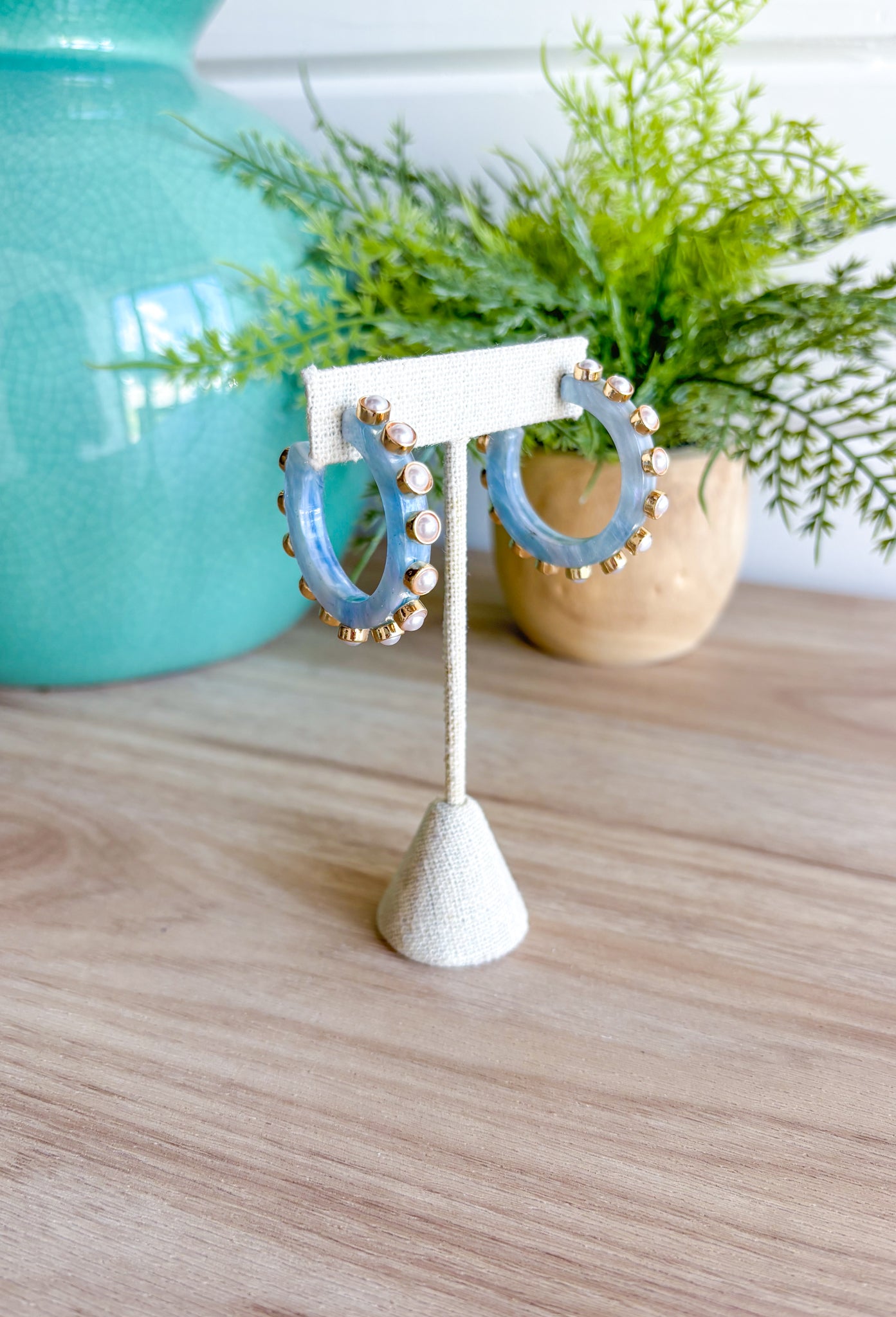 On The Weekend Earrings in Blue, acrylic blue hoop earrings with gold and pearl studs 