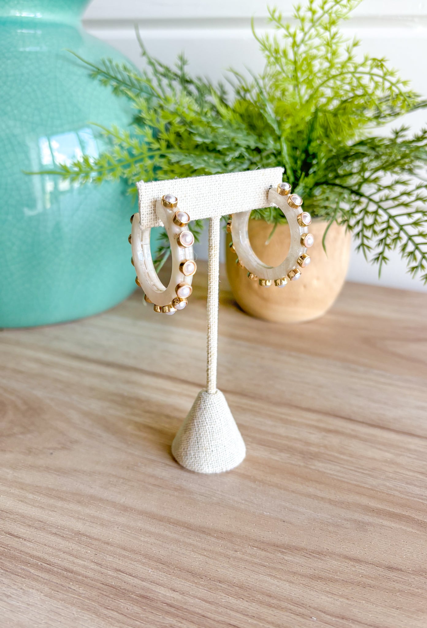 On The Weekend Earrings in White, acrylic creamy white hoop earrings with gold and pearl studs 