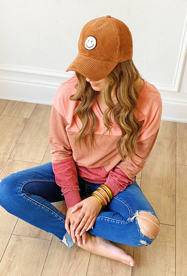 All Smiles Corduroy Hat in Brown, brown corduroy hat with smiley face patch