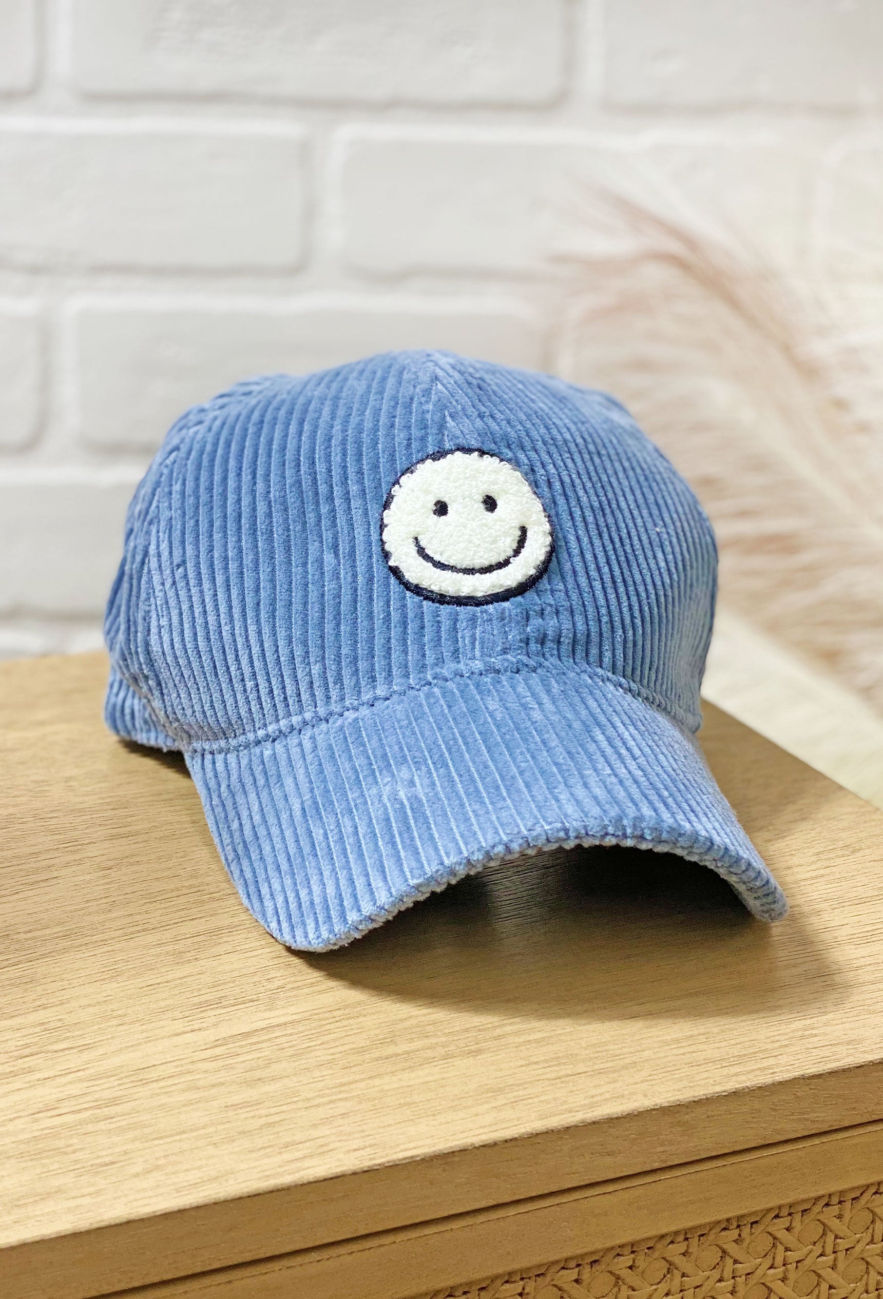 All Smiles Corduroy Hat in Dusty Blue | Groovy's