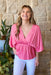 Dolman, Beckham Blouse in Pink, Lightweight blouse that has a plunging v-neckline, breezy dolman sleeves and an elastic waist